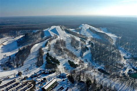Caberfae ski resort - Caberfae Resort is a family-friendly ski area in the winter that also has golf in the summer. There is slope-side lodging that makes it an even more attractive place for families to …